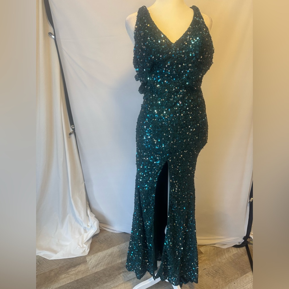 Green full sequin gown,size 0 front slit, longer back, slightly & pretty back